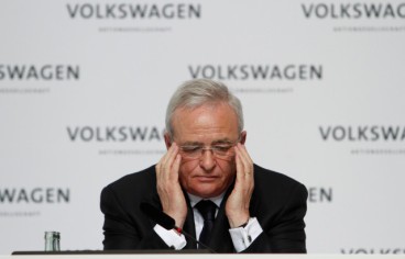 FILE PHOTO: Martin Winterkorn, chief executive officer of Volkswagen AG, reacts during an earnings news conference at the company's headquarters in Wolfsburg, Germany, on Monday, March 12, 2012. Volkswagen said 11 million vehicles were equipped with diesel engines at the center of a widening scandal over faked pollution controls that will cost the company at least 6.5 billion euros ($7.3 billion). Photographer: Michele Tantussi/Bloomberg *** Local Caption *** Martin Winterkorn